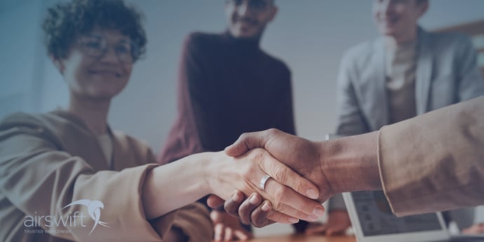 Candidate shake hands with recruiter